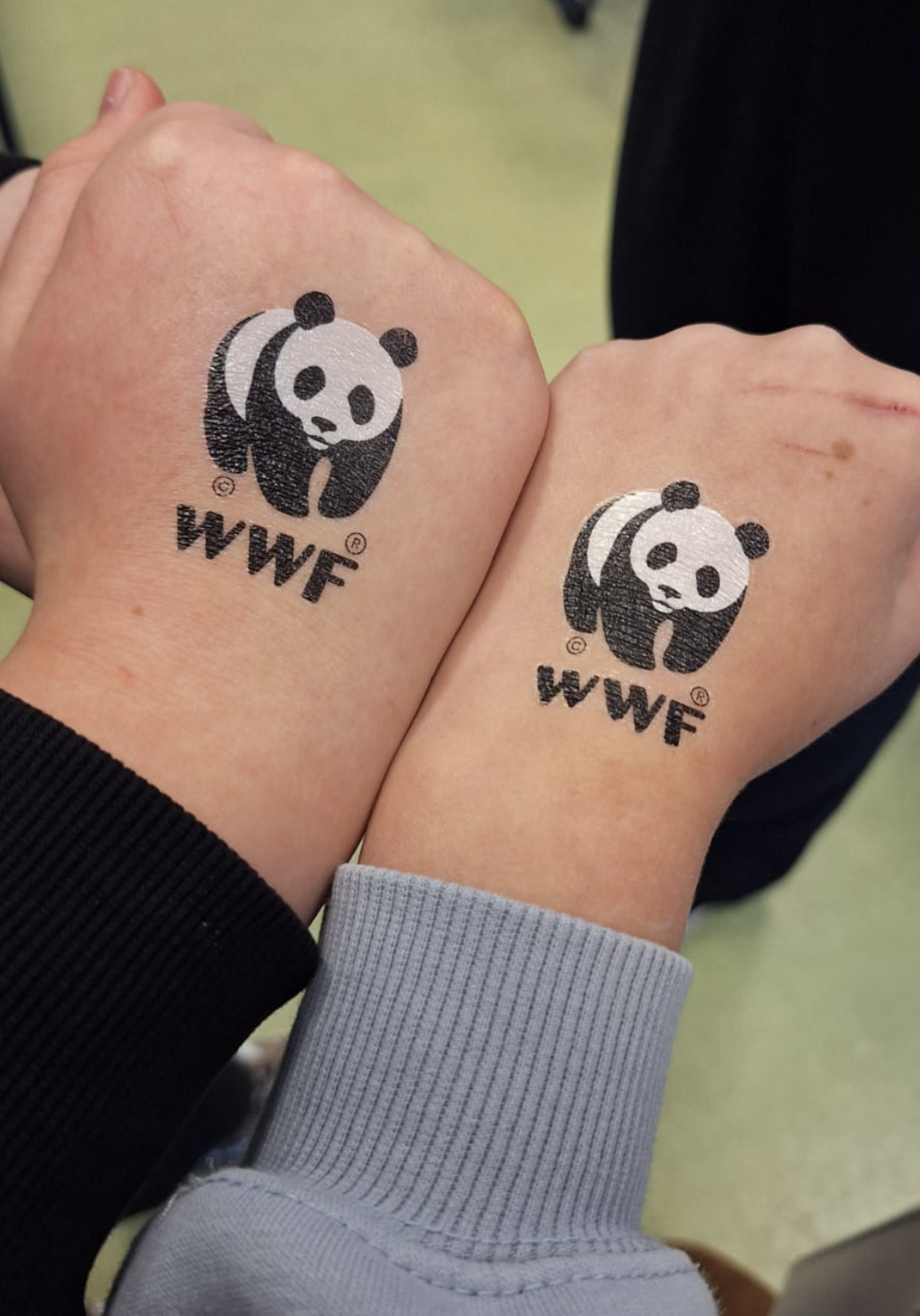 WWF tatoeage op kinderhanden