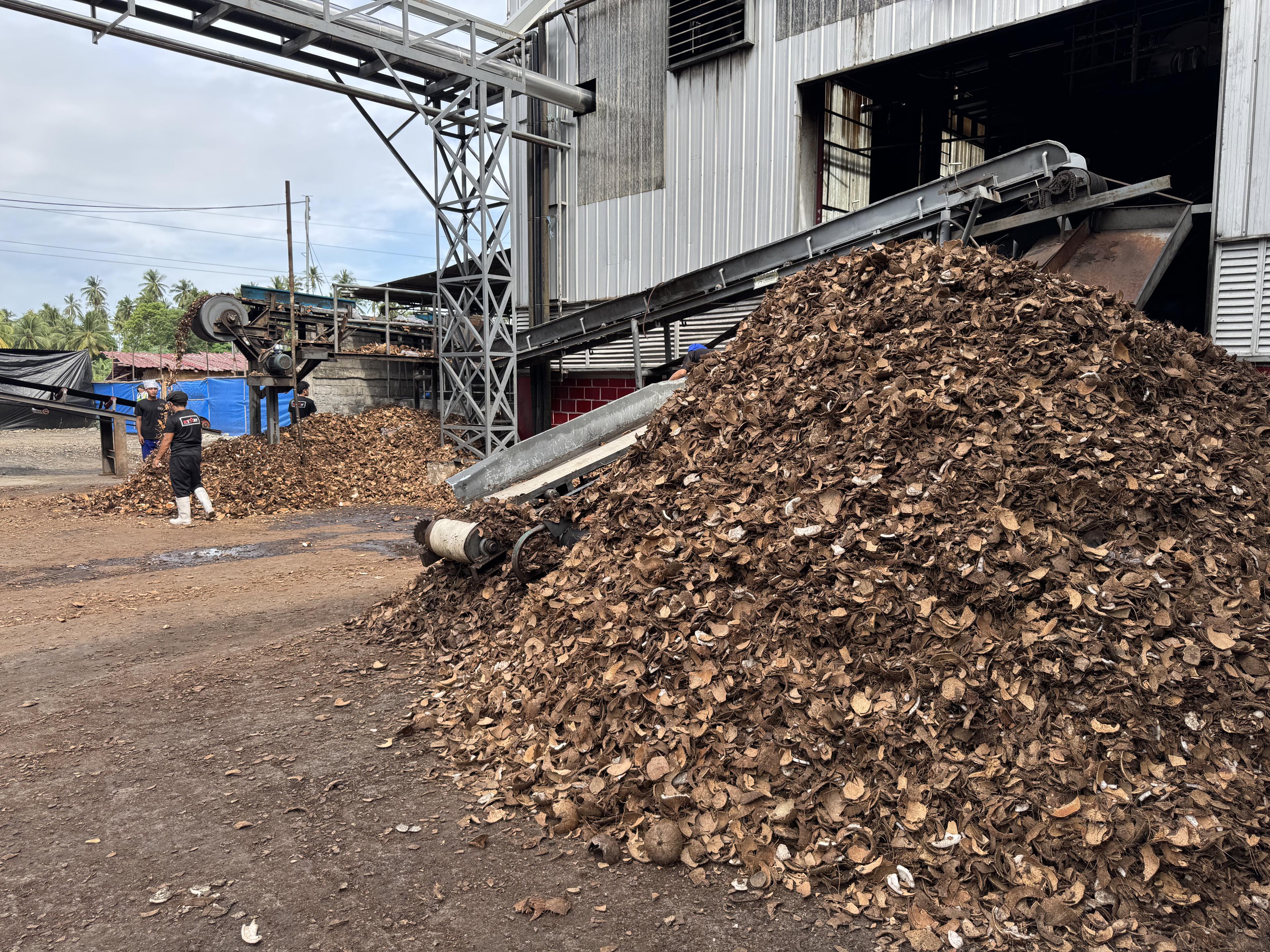 coconut shells outside a factory Philippines