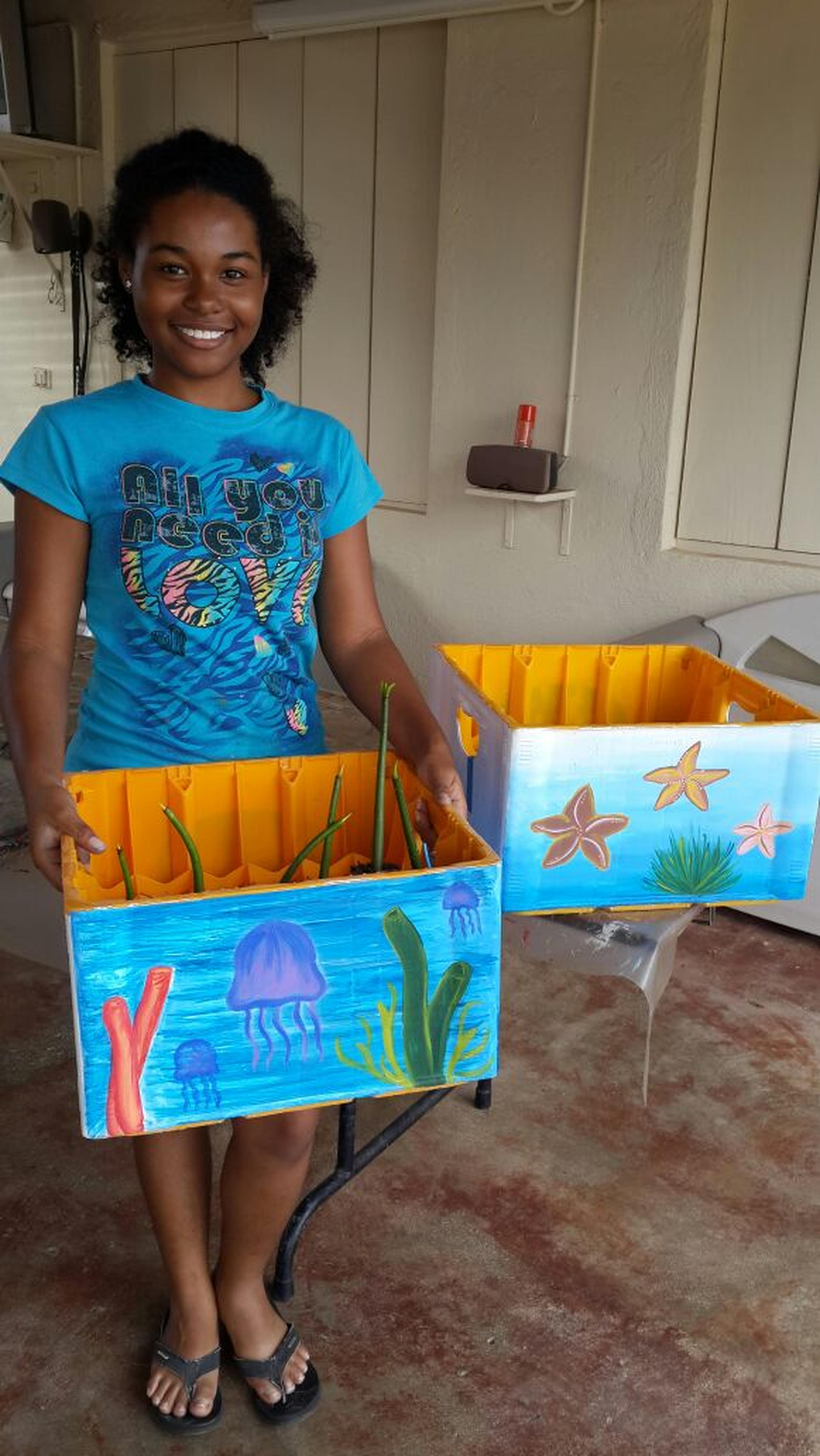 Student met mangrovestekjes