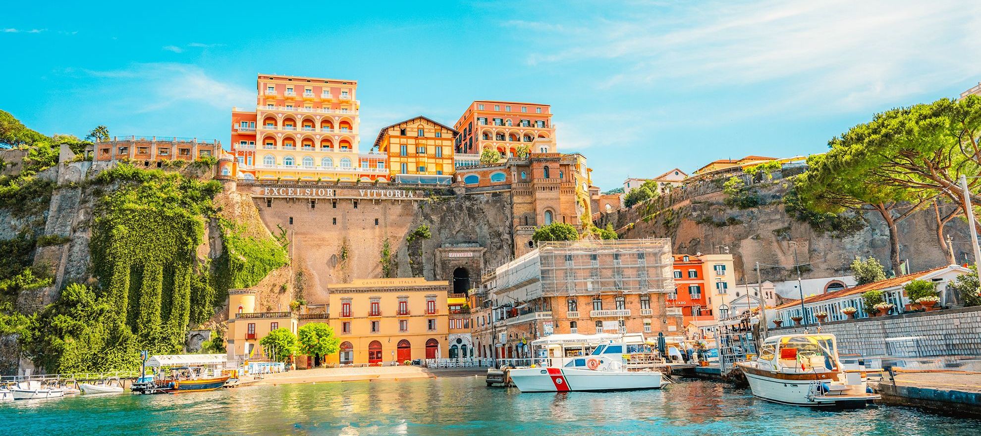 Streets in a touristic town, Sorrento near Amalfi coast, Italy. with a view of Naples and the Vesuvius volcano in the background