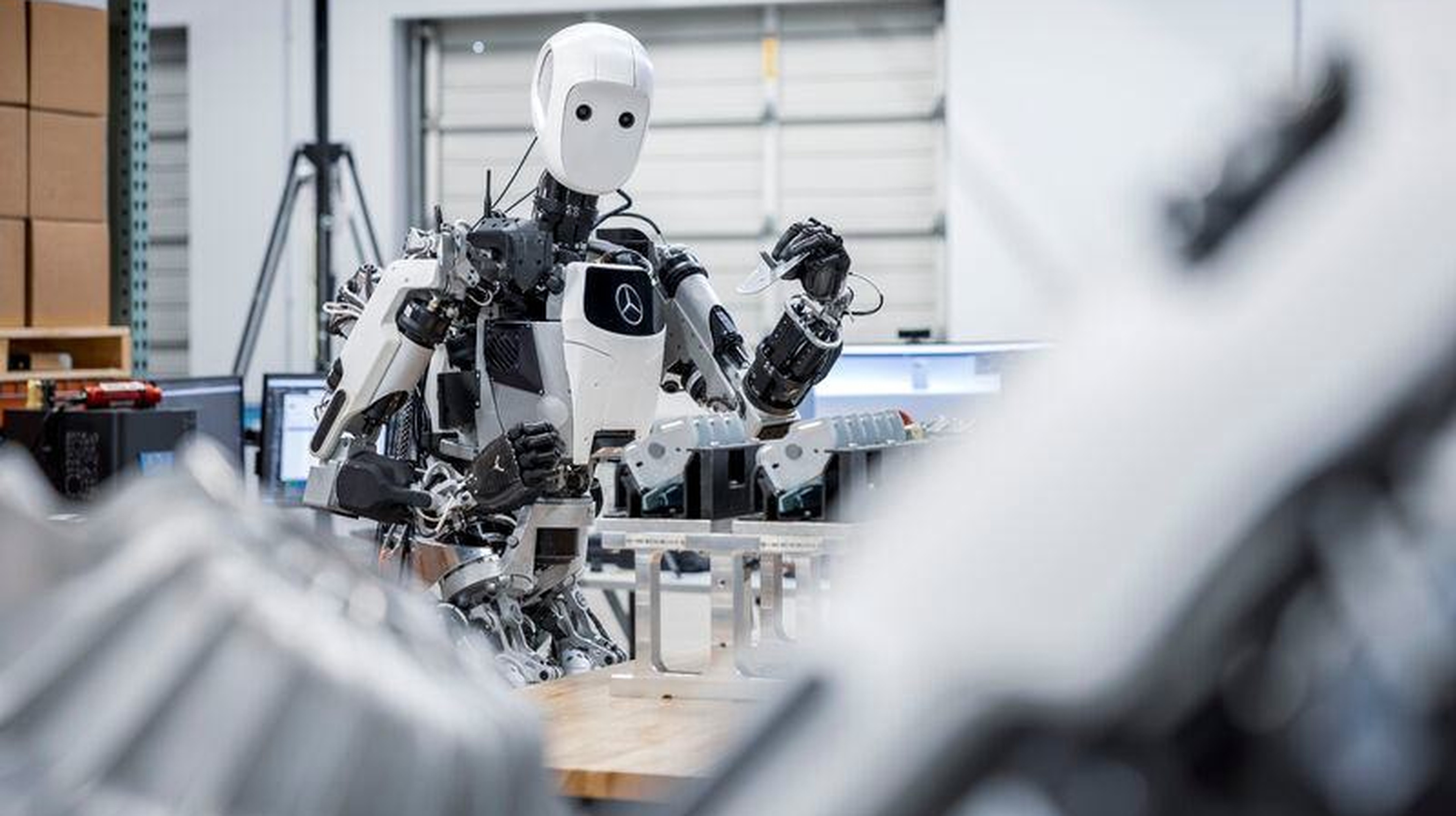 Humanoid warehouse robot in an automated test cell — Fennec Engineering ASAP testing environment