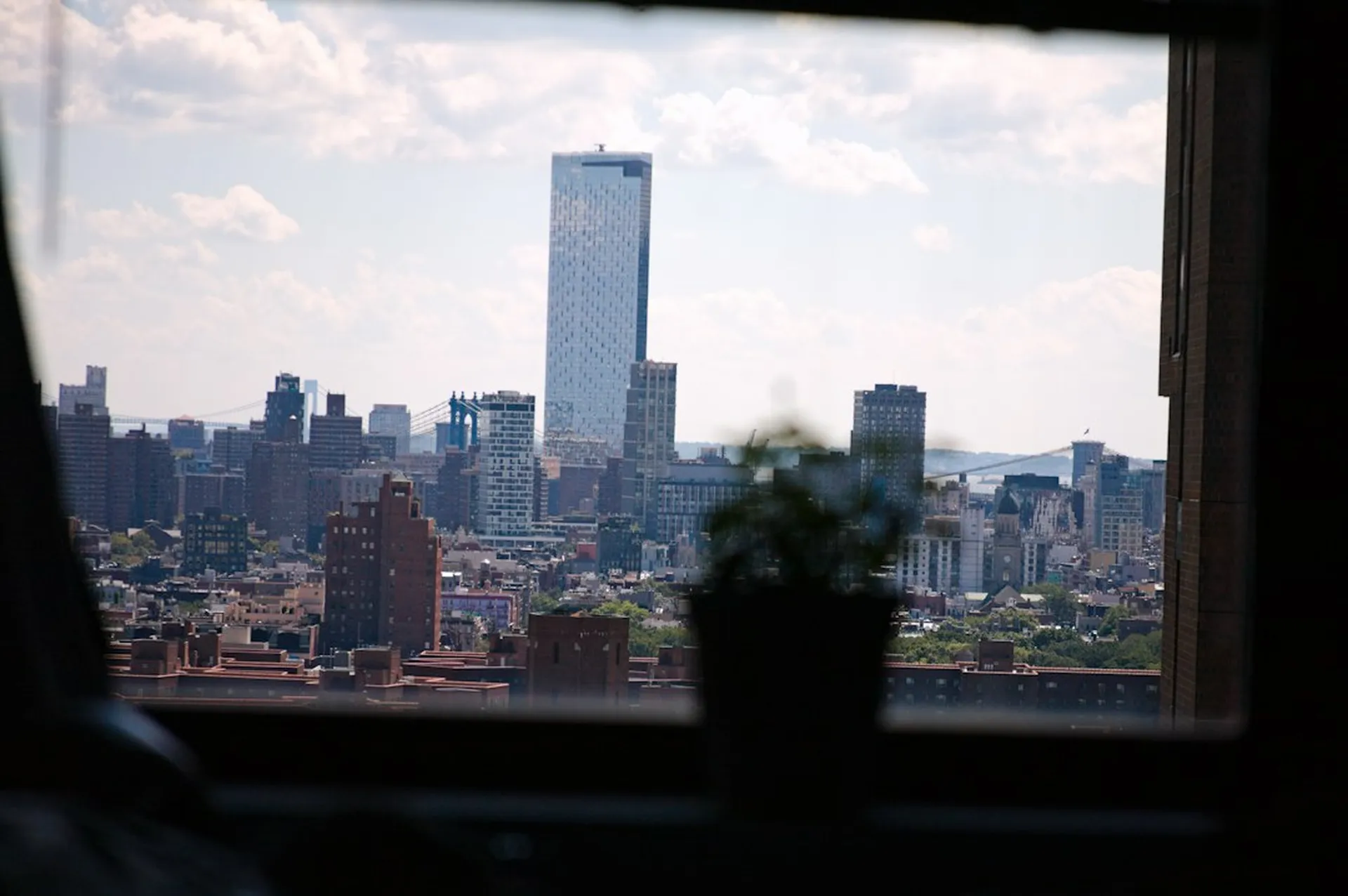 Manhattan skyline seen through an apartment window