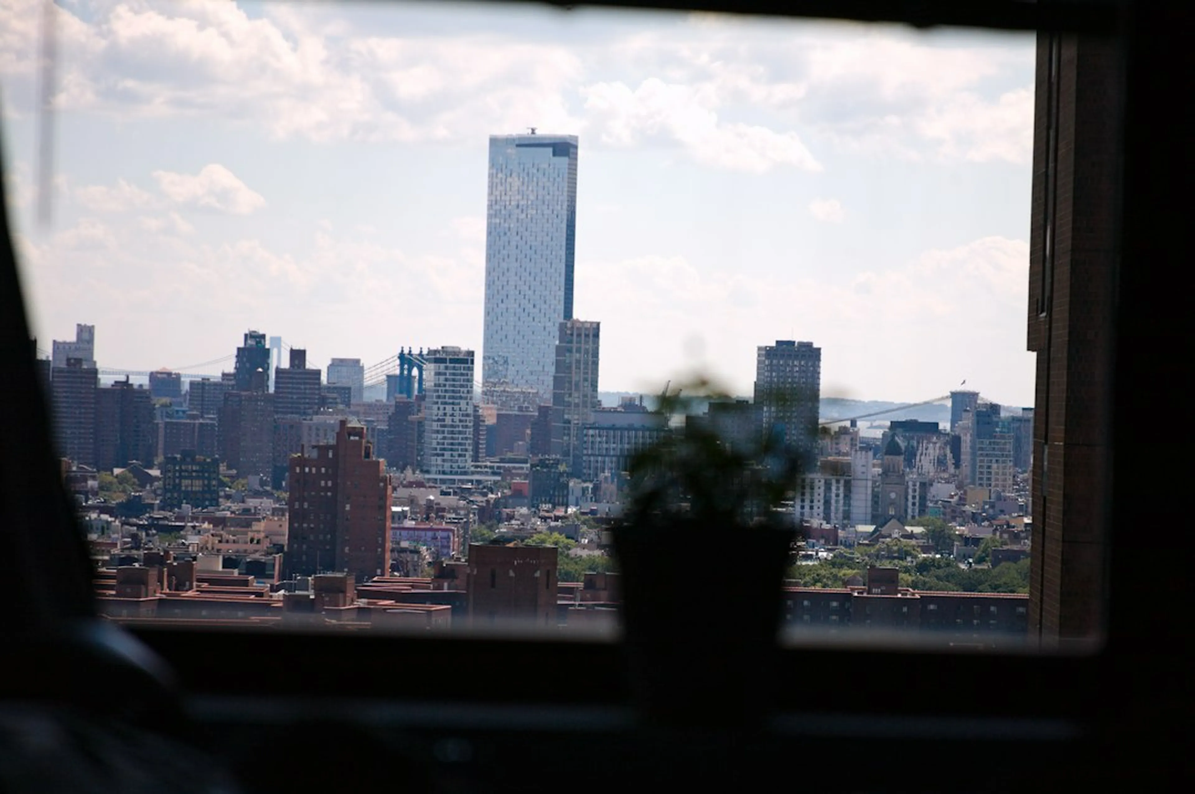 Manhattan skyline seen through an apartment window