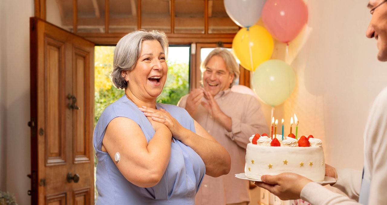 Person wearing Dexcom G7 CGM at a birthday