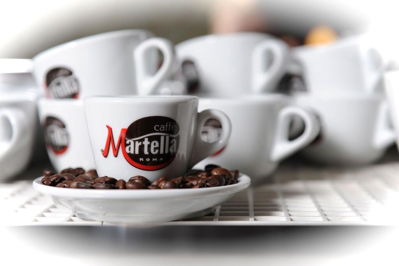 Caffè Martella team member talking with a customer