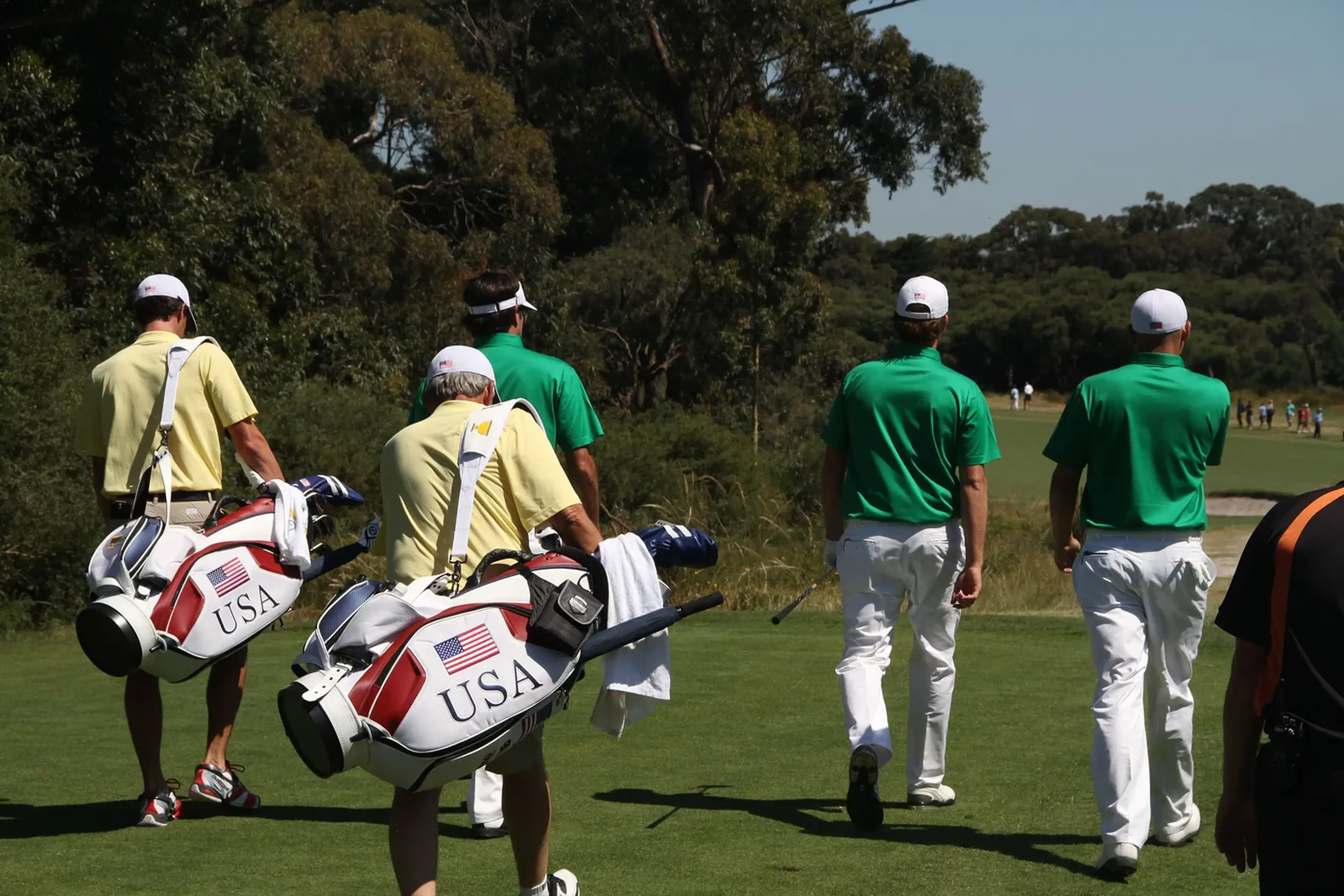 Players and caddies walking down the 7th at Royal Melbourne