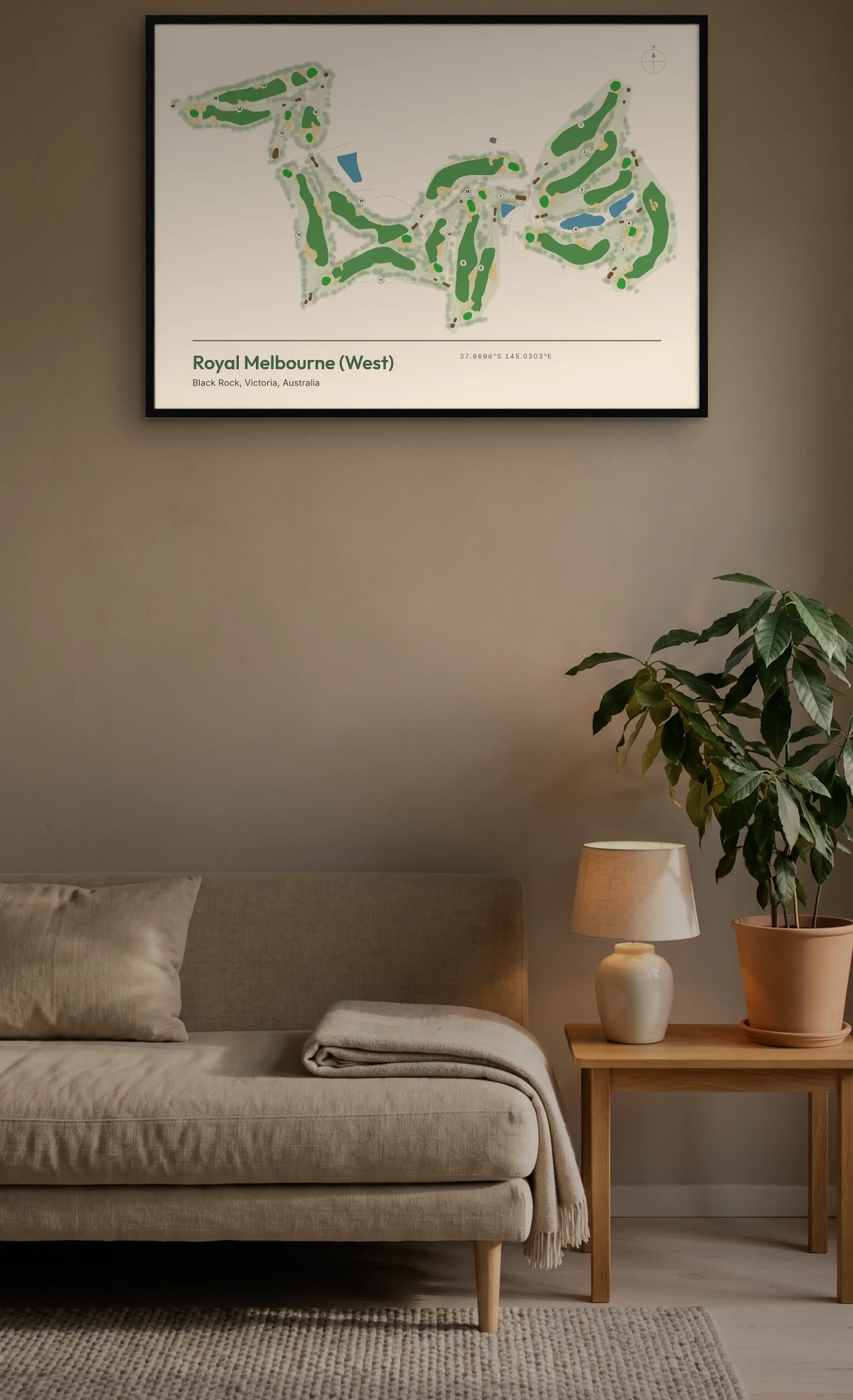 Royal Melbourne West, drawn as a landscape A0 print in a Black frame, on a lounge wall above a sofa and a lamp