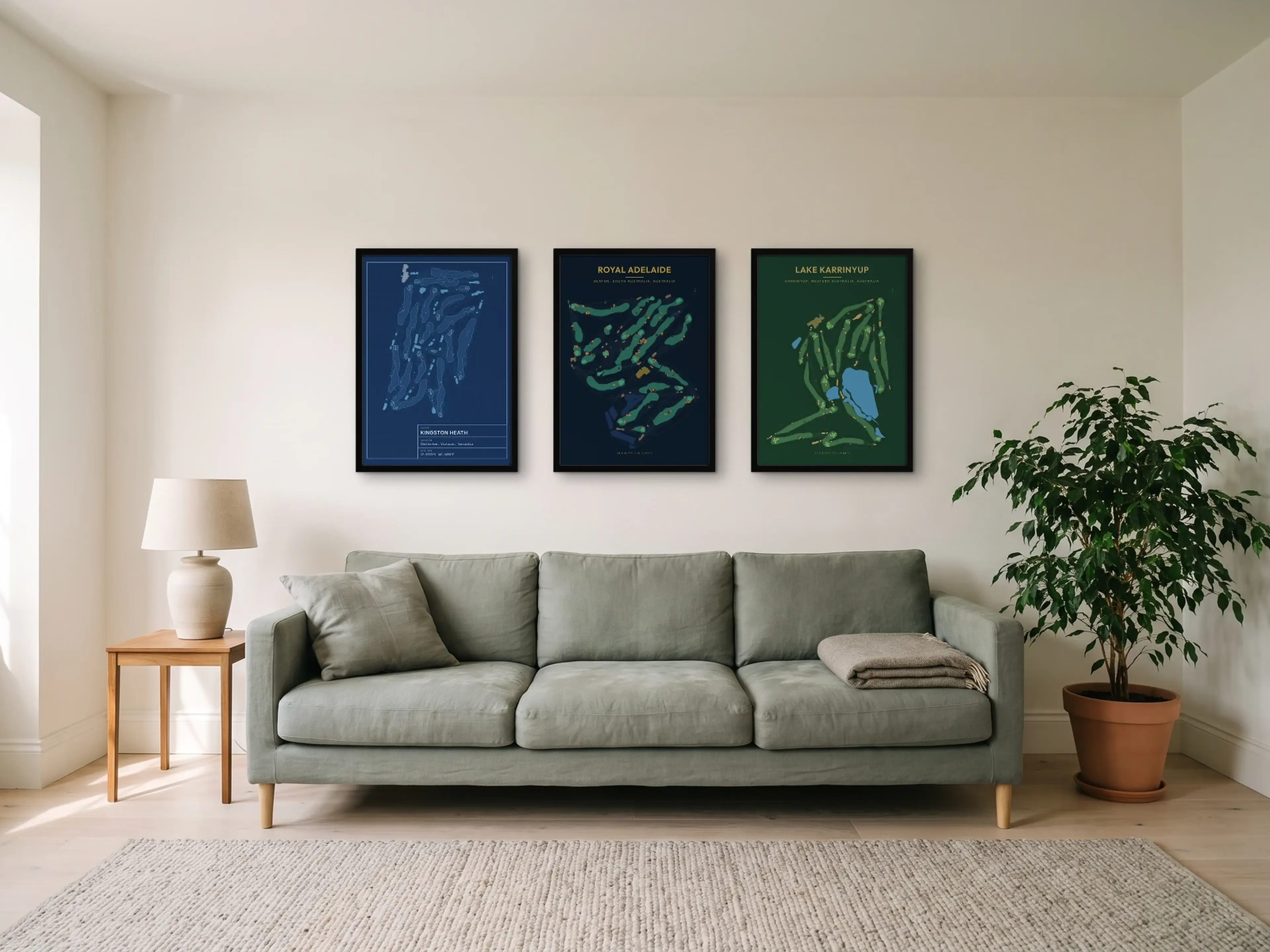 Three course prints in matching black frames, hung as a gallery wall above a sofa