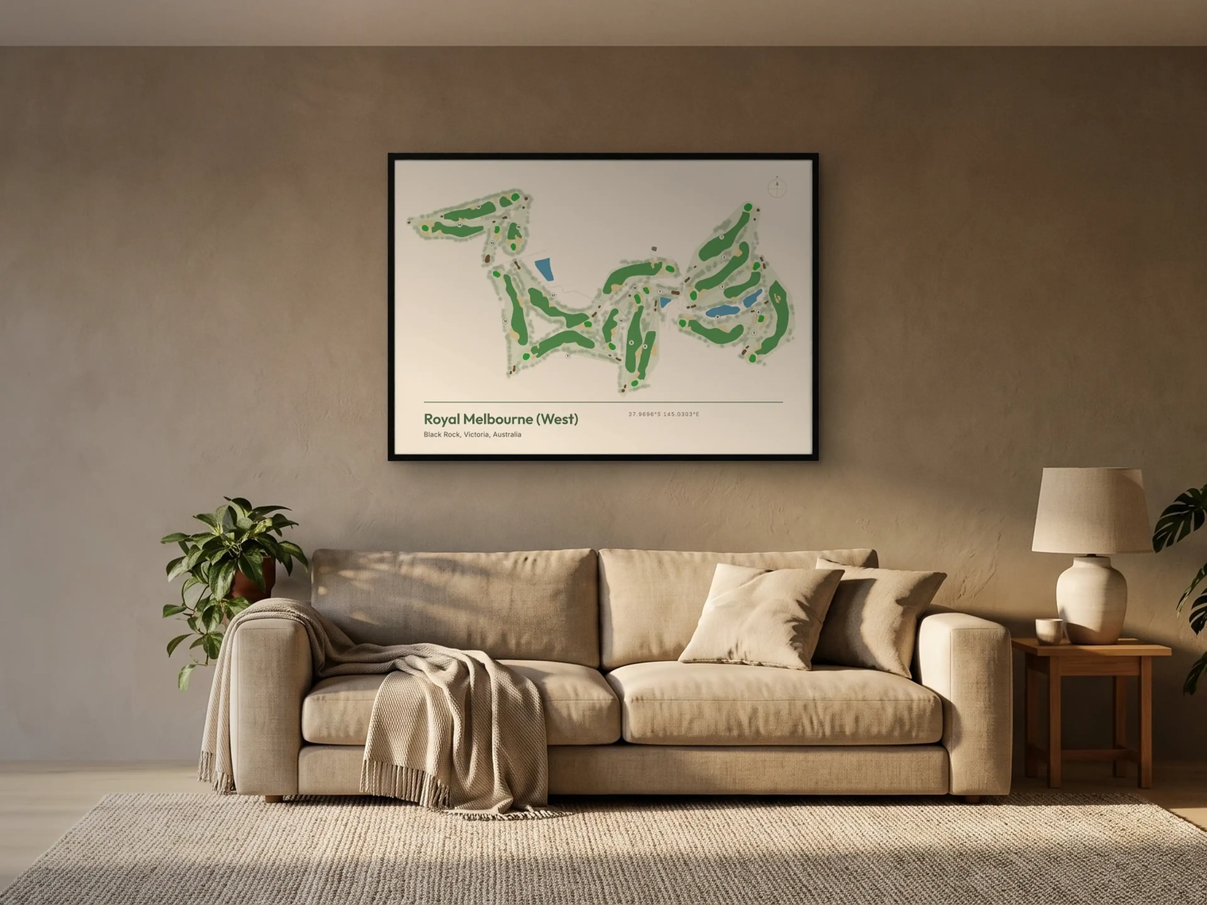 A Royal Melbourne (West) print in a black frame above a sofa