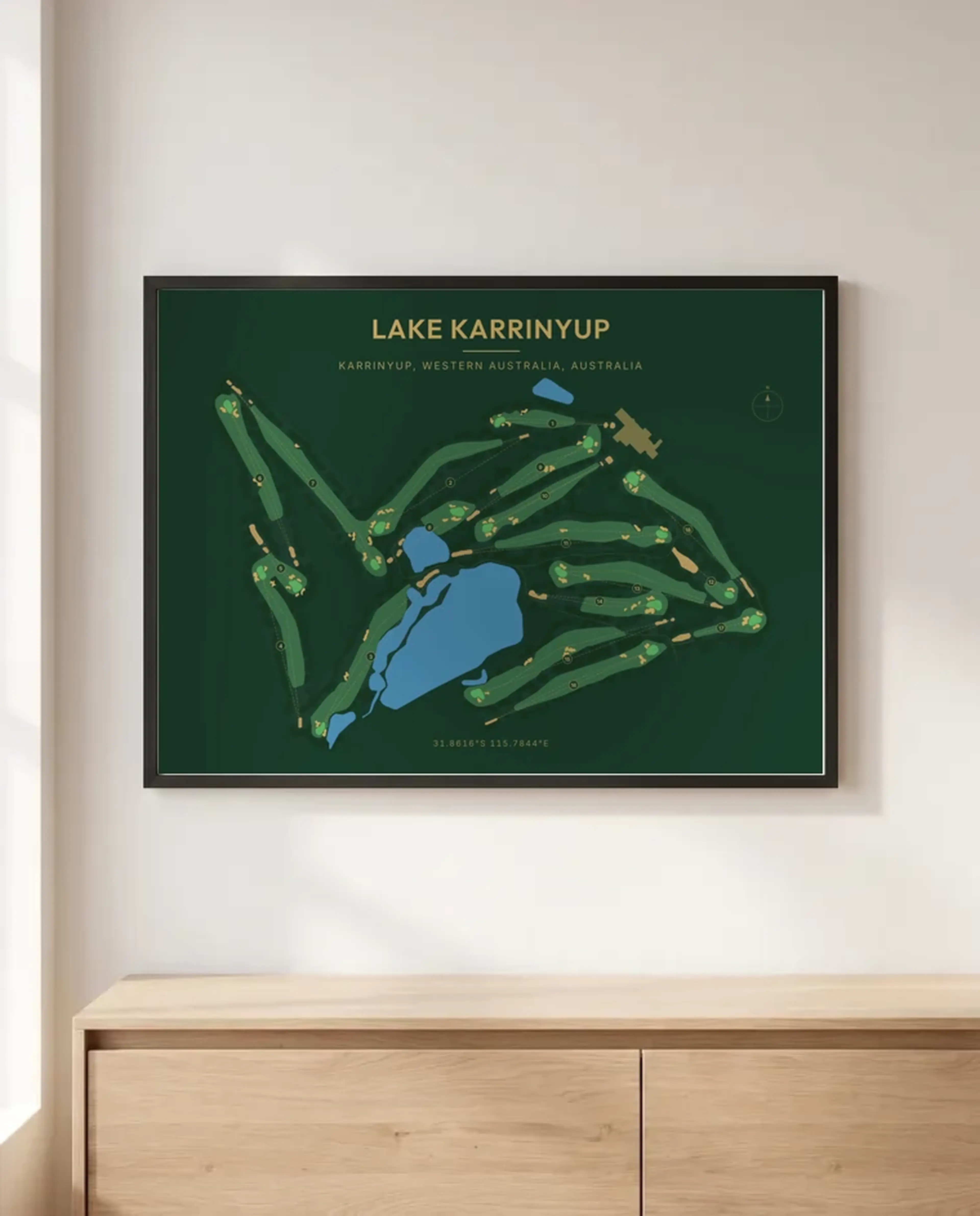 A Lake Karrinyup print in Classic Dark, in a black frame above a sideboard