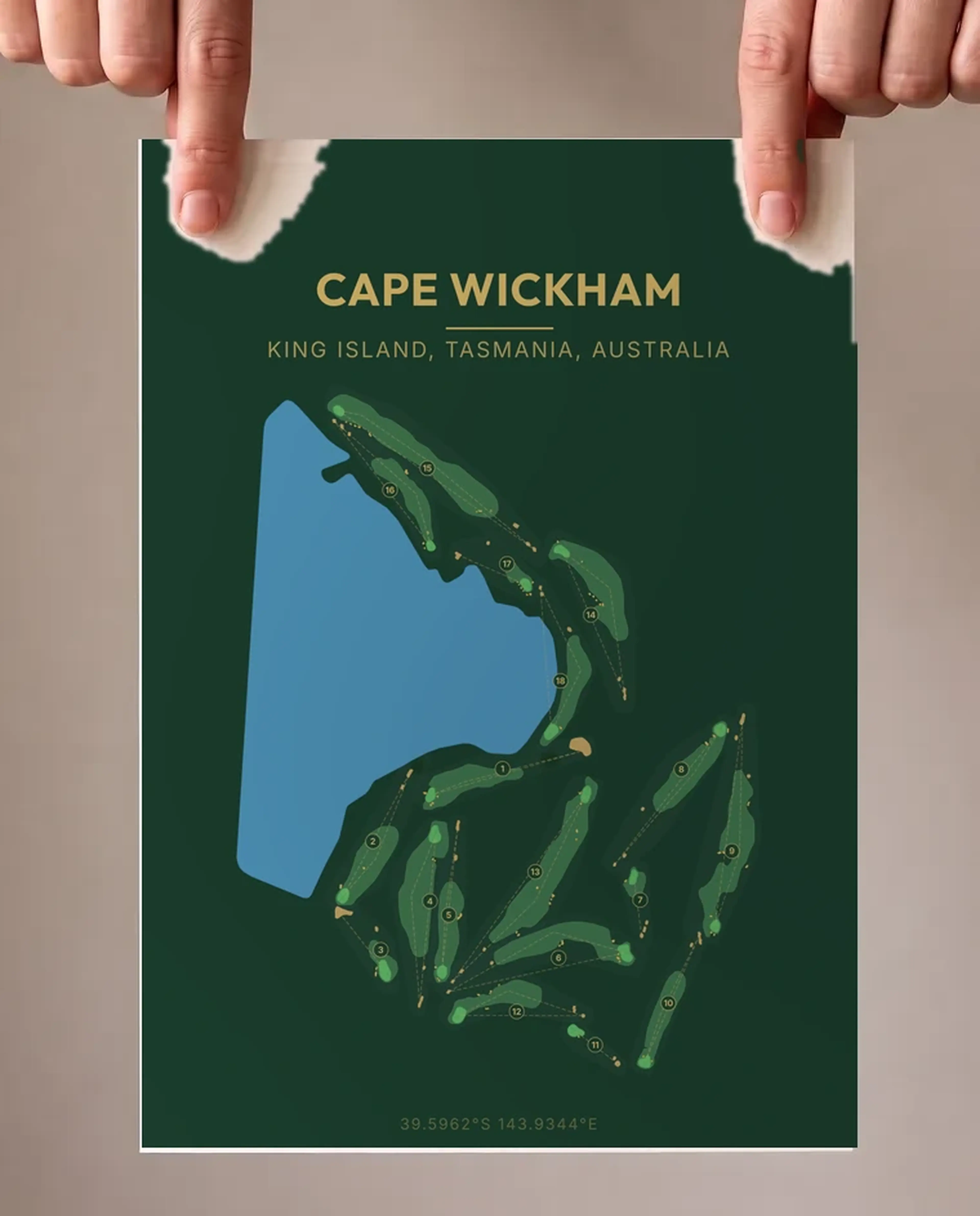 Hands holding an unframed Cape Wickham print in Classic Dark