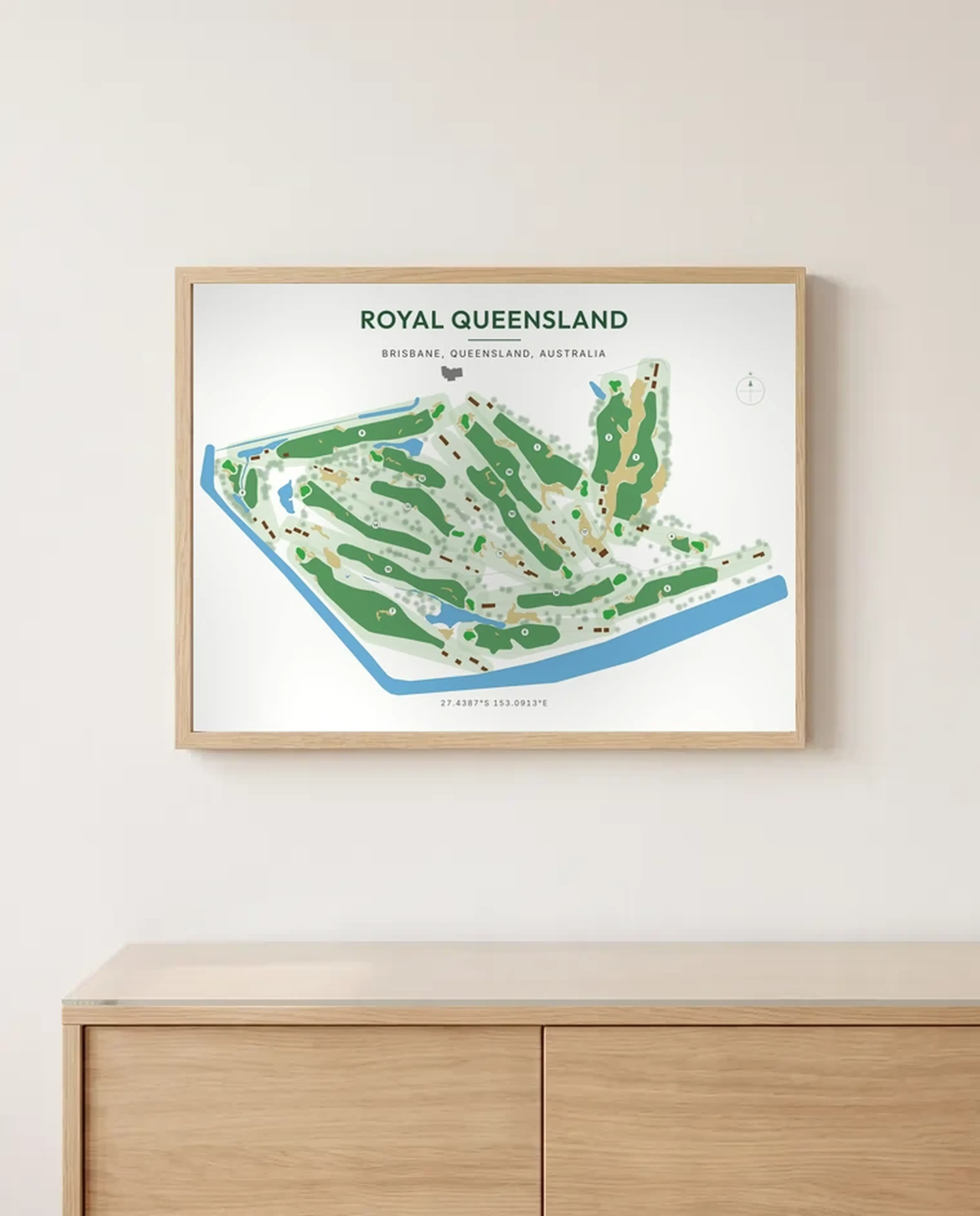 A Royal Queensland print in a Natural frame above a sideboard