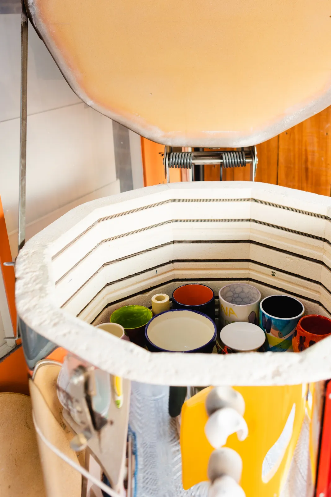 The kiln, open and full of freshly fired glazed pieces