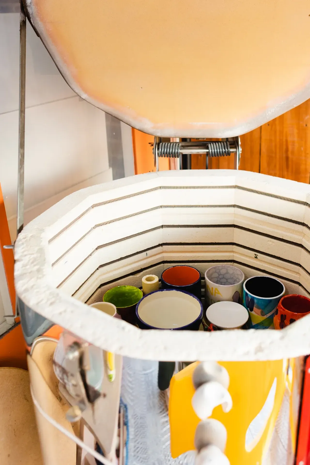The kiln, open and full of freshly fired glazed pieces