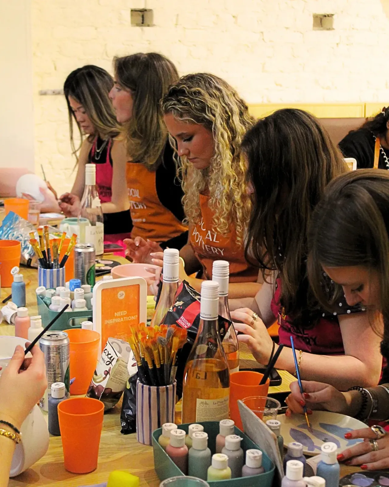 Guests painting at Studio 136