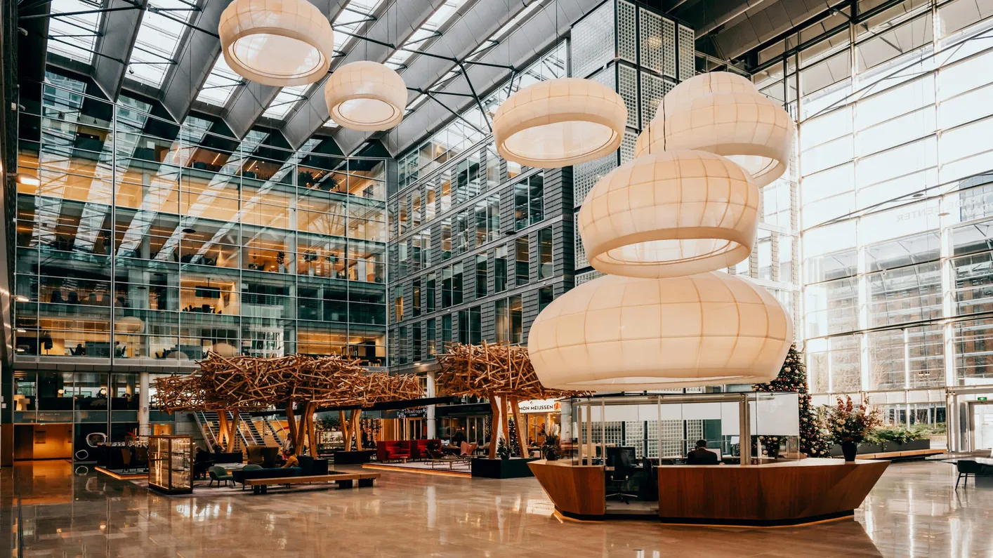 The atrium of WTC Amsterdam, where the Ace office is