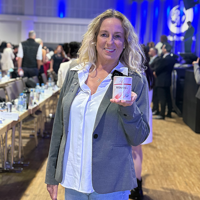 Photo of Andrea Skrotzki - the author of the testimonial - holding the product.