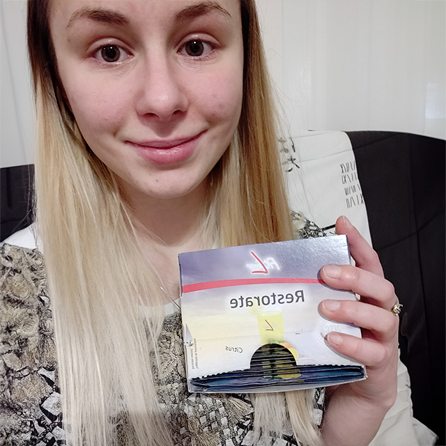 Photo of Lucie Théret - the author of the testimonial - holding the product.