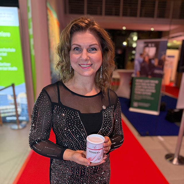 Photo of Réka Szalai - the author of the testimonial - holding the product.