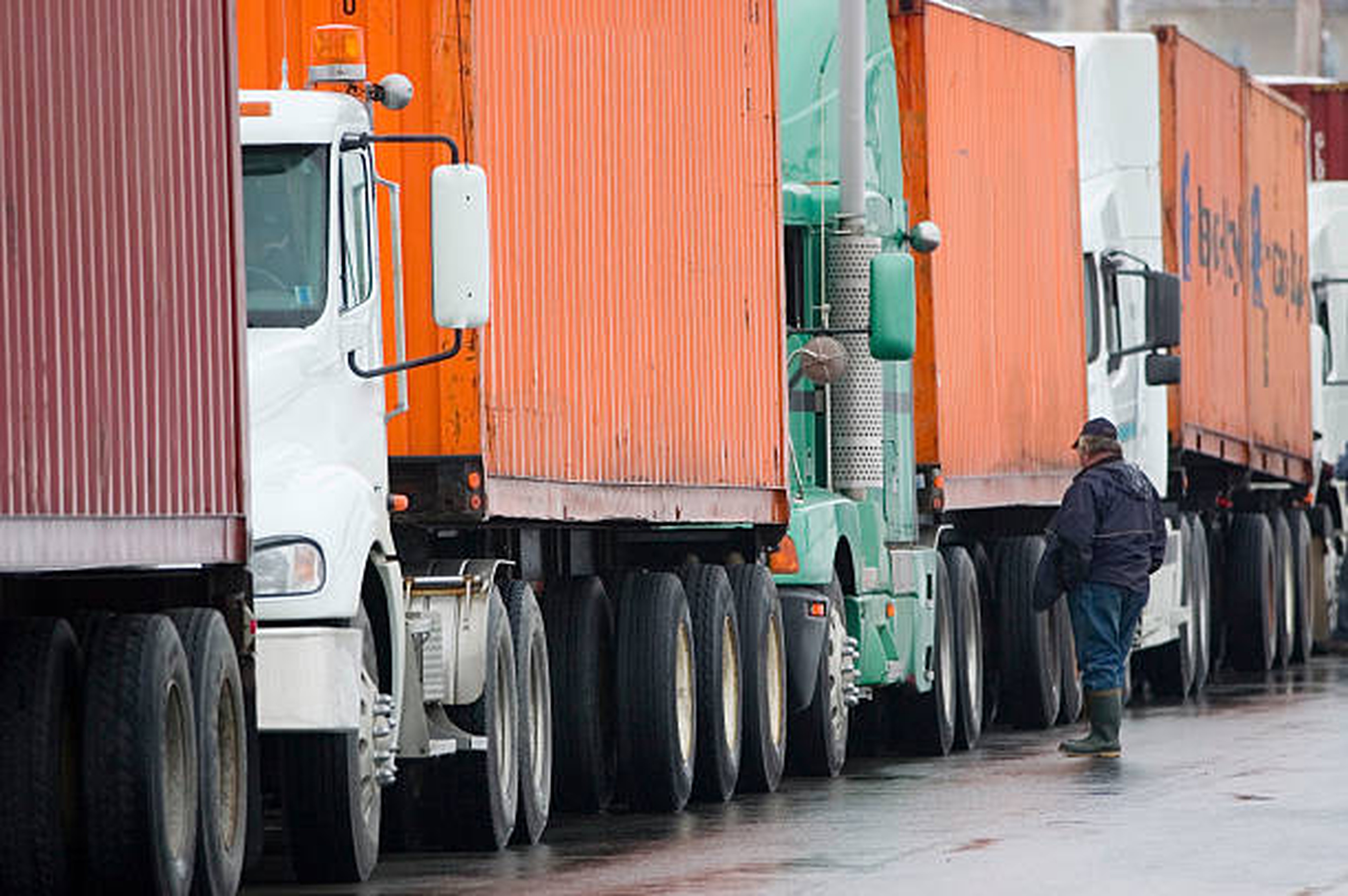Trucks waiting in front of a logistics site to be unloaded