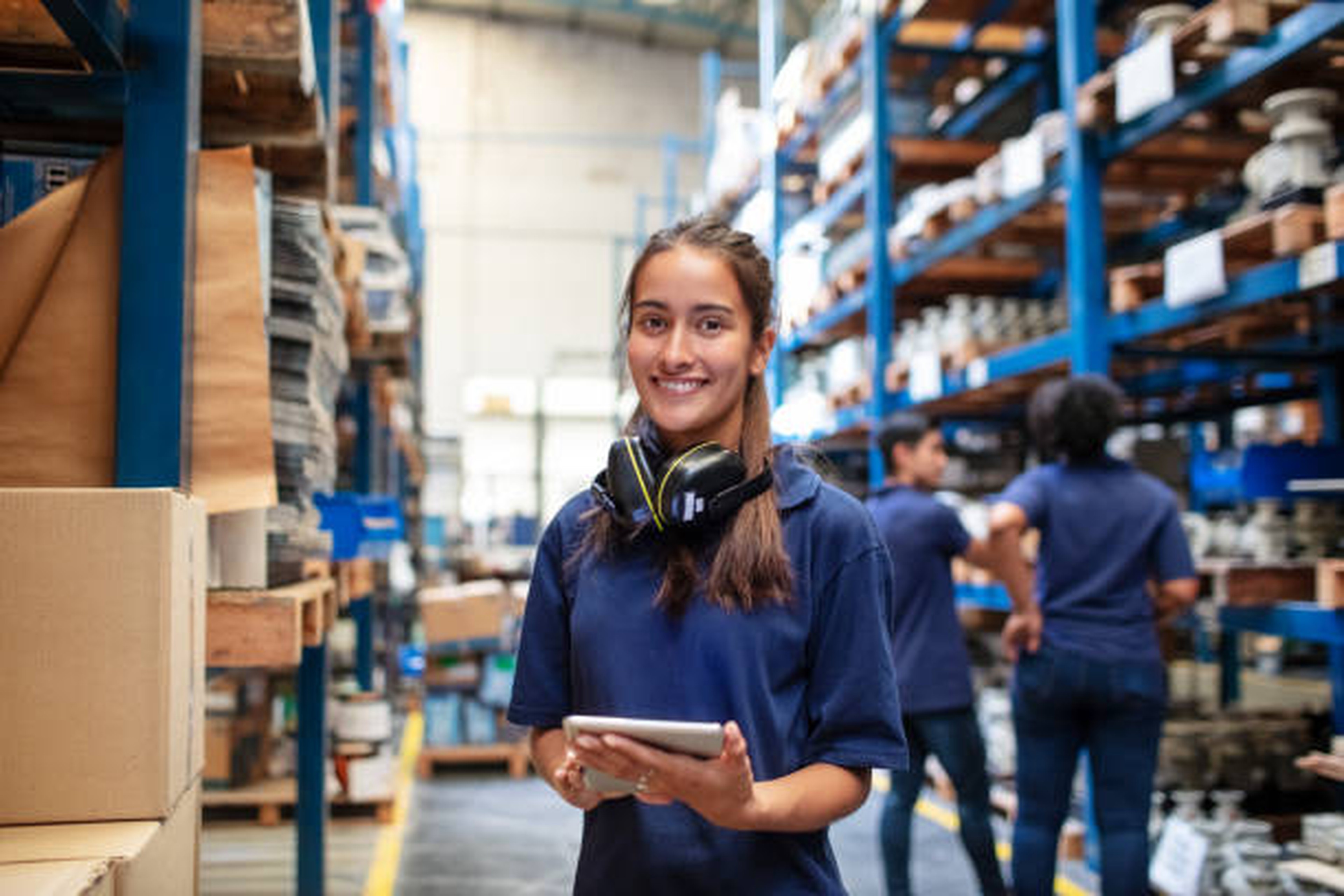 Management of goods inside logistics site by a young employee