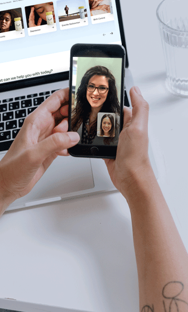 A person at home taking a video visit with a clinician