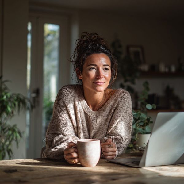 Woman reading a lender decision on her phone