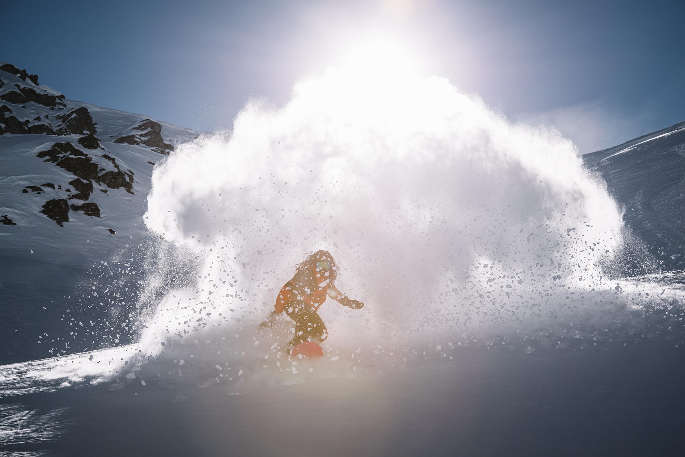 David Djite snowboarding in Laax. Photo: Dominic Zimmermann.