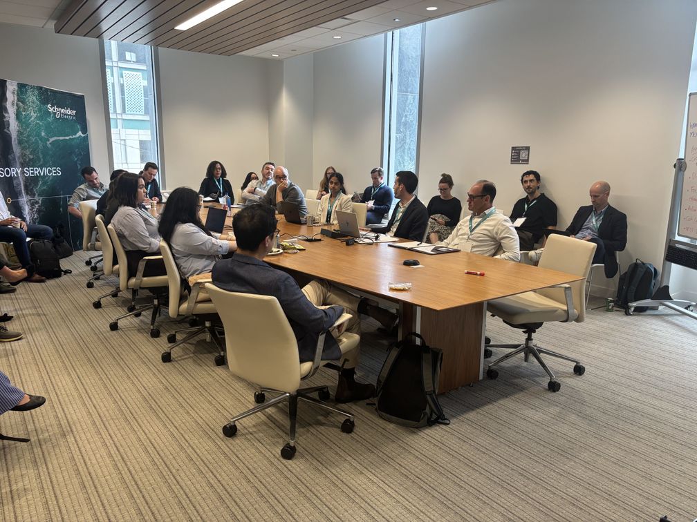 Attendees seated around a conference table during Scope 3 Peer Group Strategy Day Chicago 2026