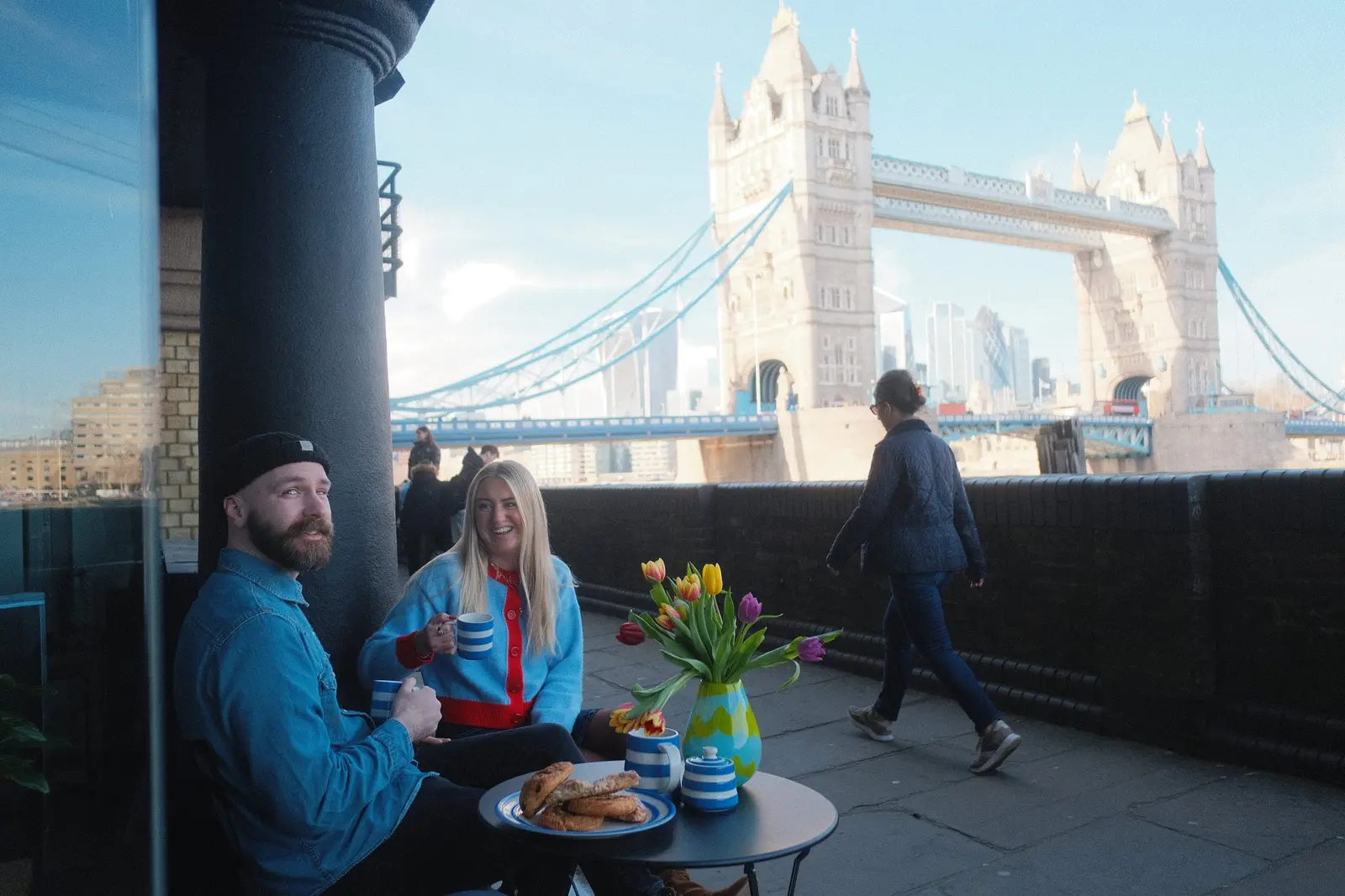 The Tom&Co team meeting outdoors by Tower Bridge