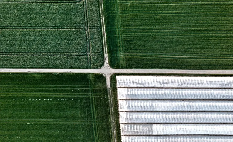 Agriculture drone for elevated insight | DeltaQuad Evo Enterprise farming drone image of farmland and greenhouse