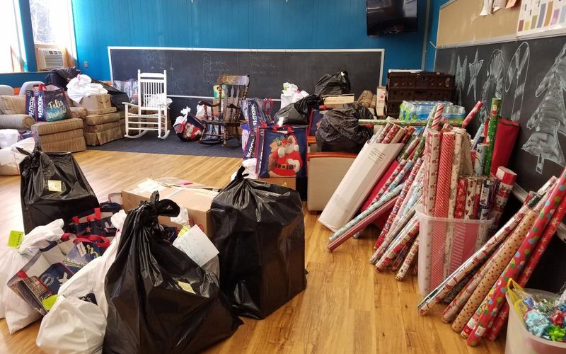 Christmas of Hope gifts and wrapping paper ready for families