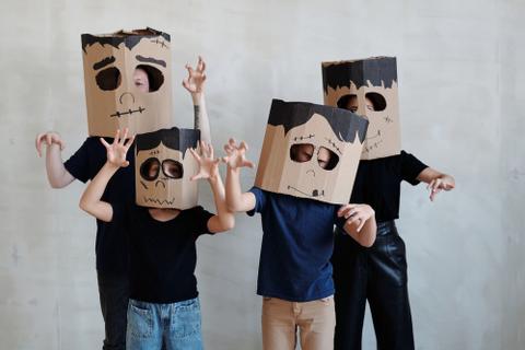A Family Wearing a DIY Cardboard Box Mask