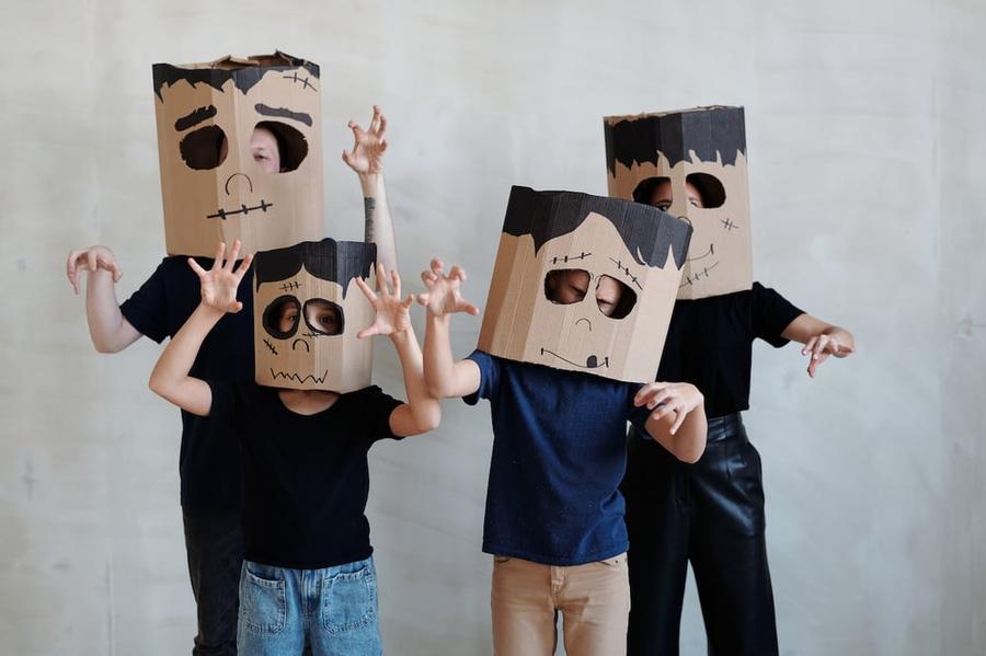 A Family Wearing a DIY Cardboard Box Mask