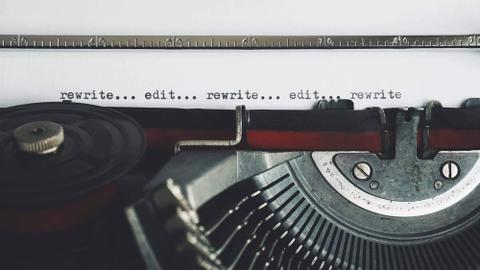 up close of typewriter line rewrite... edit... rewrite... edit