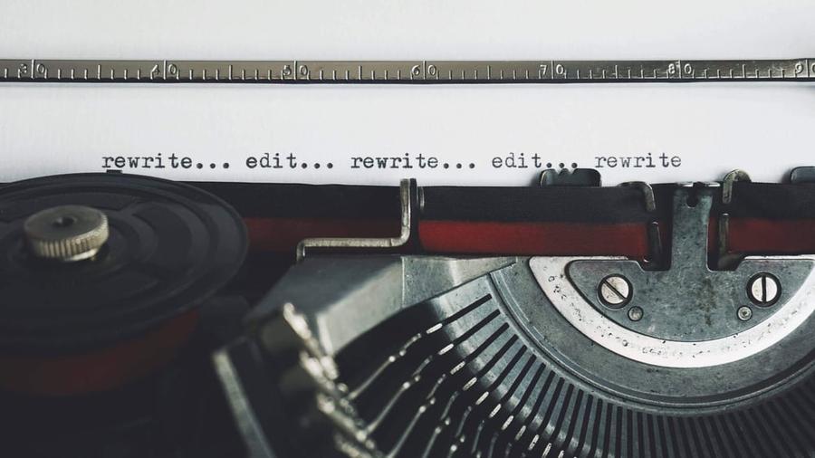 up close of typewriter line rewrite... edit... rewrite... edit