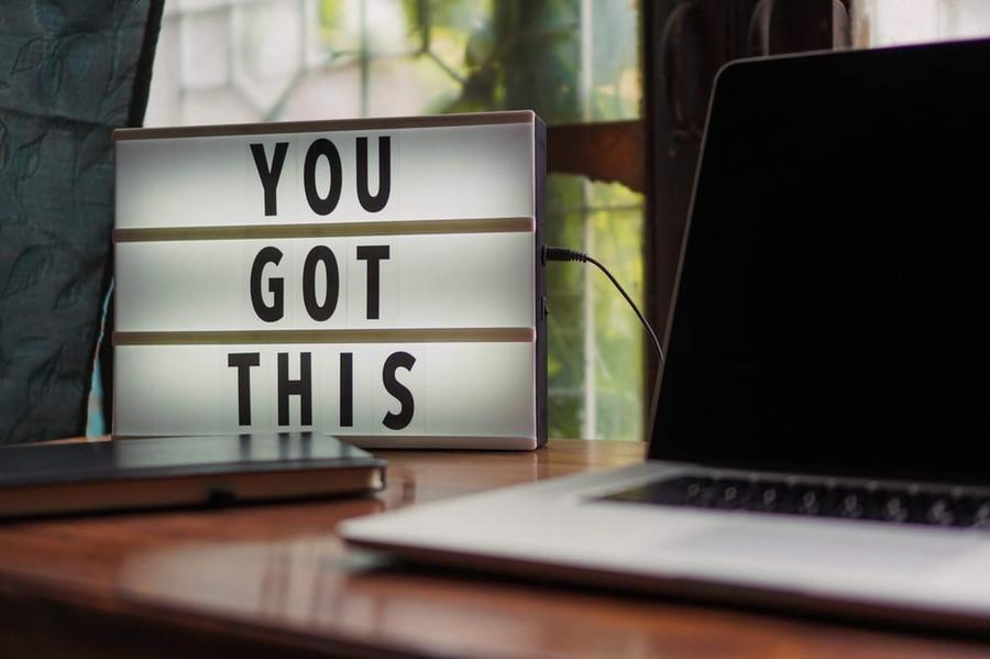 A lit sign reading "You got this."