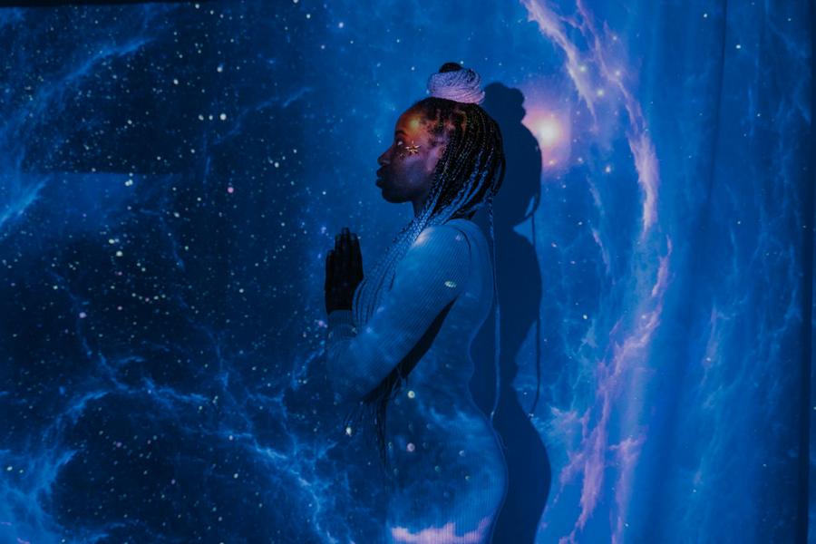 Stars projected onto a person.
