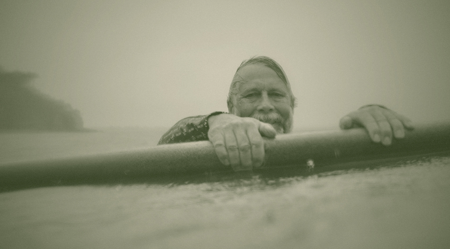 Tom Wegener with a surfboard