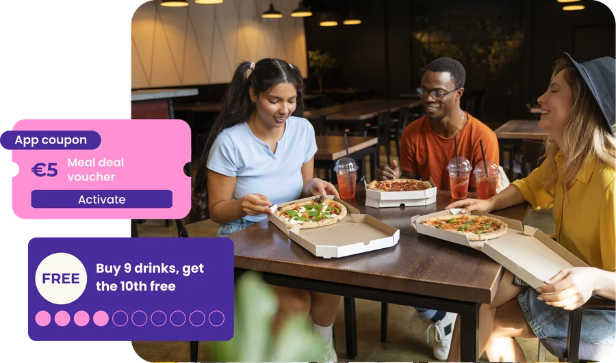 Friends eating a takeaway meal beside a €5 meal deal voucher and a stamp card reading 'buy 9 drinks, get the 10th free'