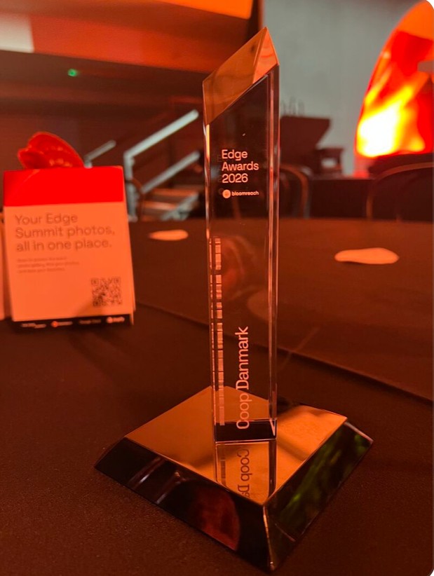 The Bloomreach Edge Awards 2026 trophy engraved with Coop Danmark