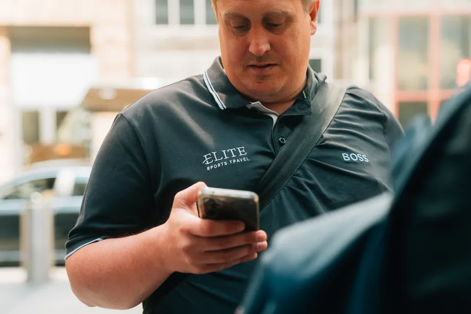 An Elite Sports Travel host at work on location.