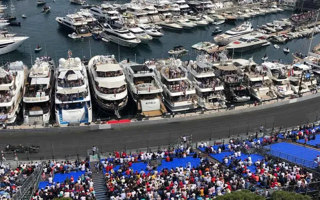 Yachts moored three deep in Monaco harbour on race weekend.