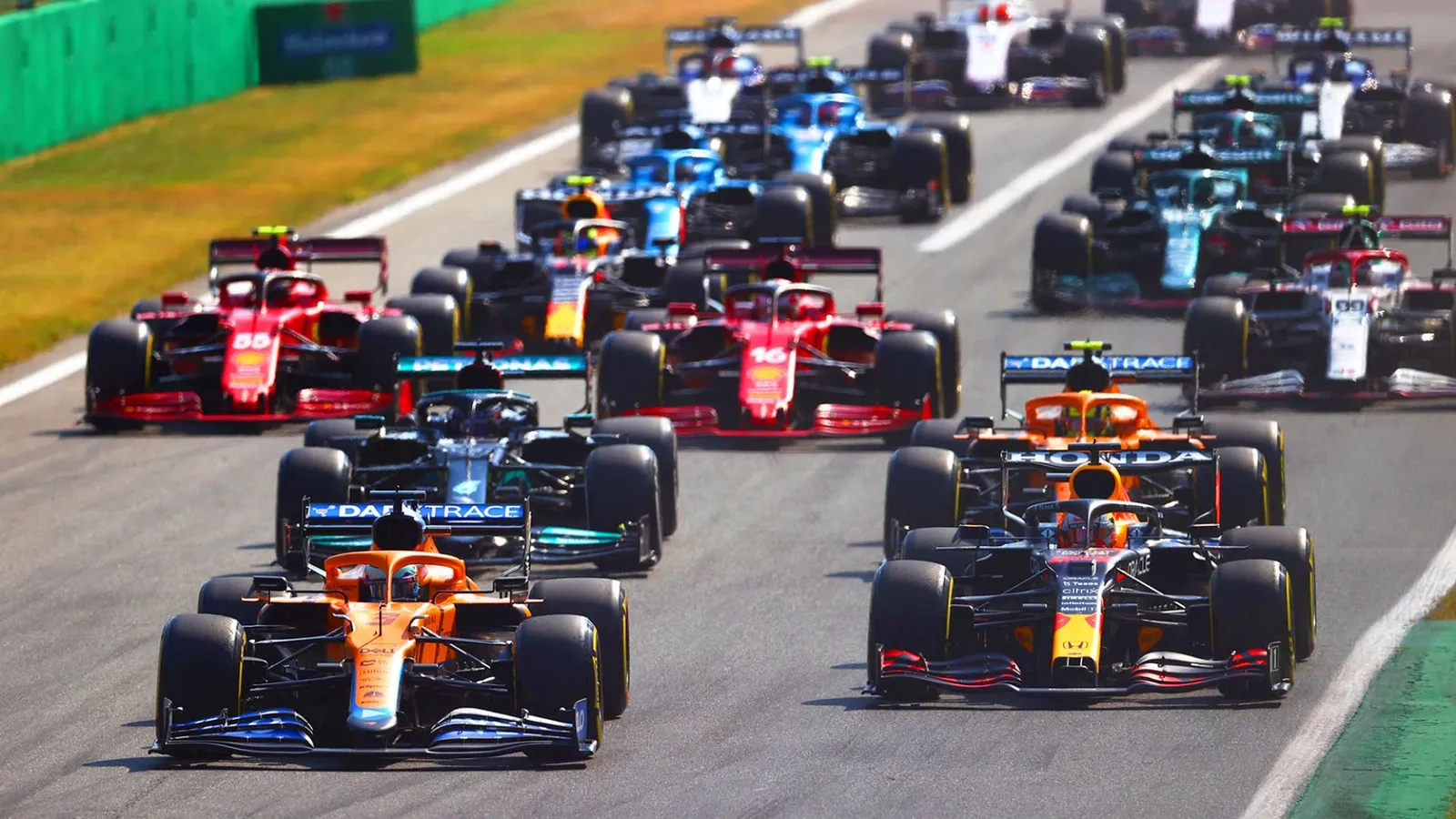 The pack through the first corners on the opening lap.