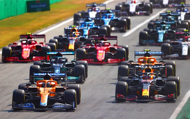 The pack through the first corners on the opening lap.