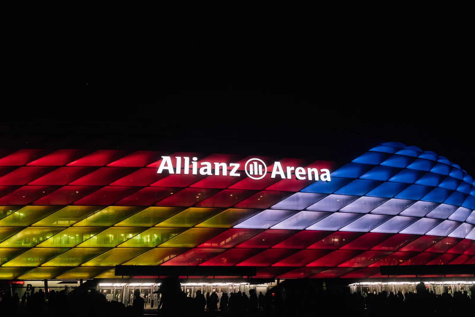 The Allianz Arena lit half in the German flag, half in the Stars and Stripes