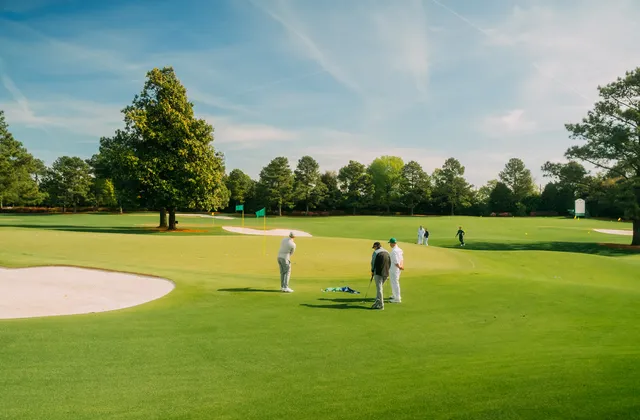 Golfers on a championship course at Reynolds Lake Oconee.