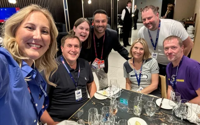 Elite staff and clients together at a hosted dinner.