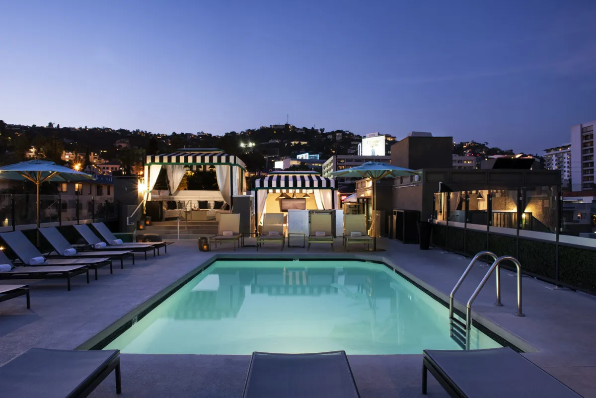 The rooftop pool at dusk, the Chamberlain.