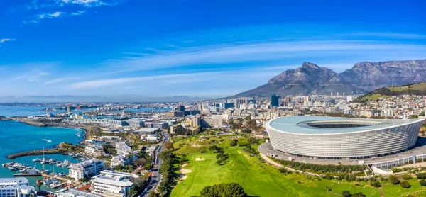 Cape Town Stadium and the coast from the air.